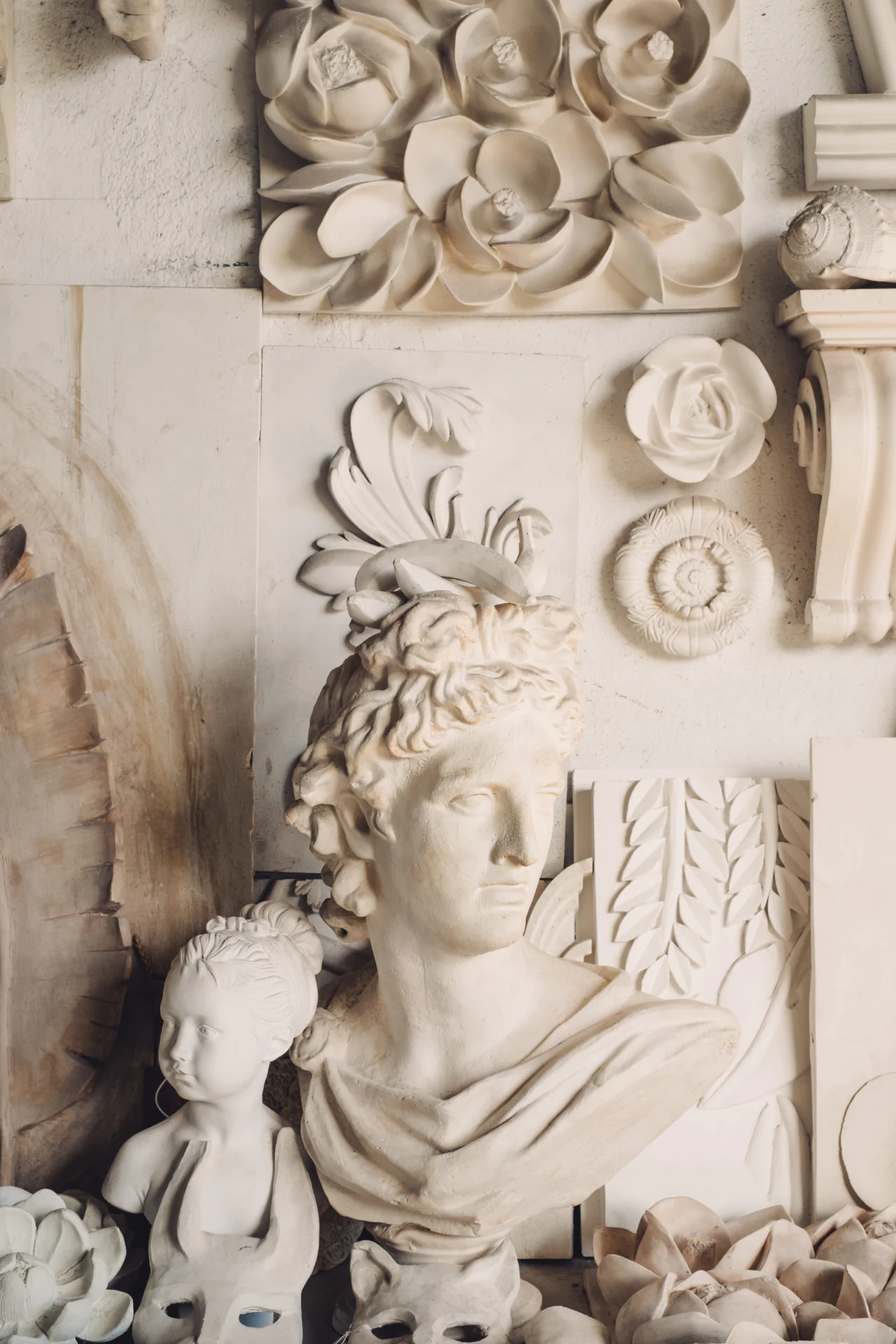 A room full of statues and busts.