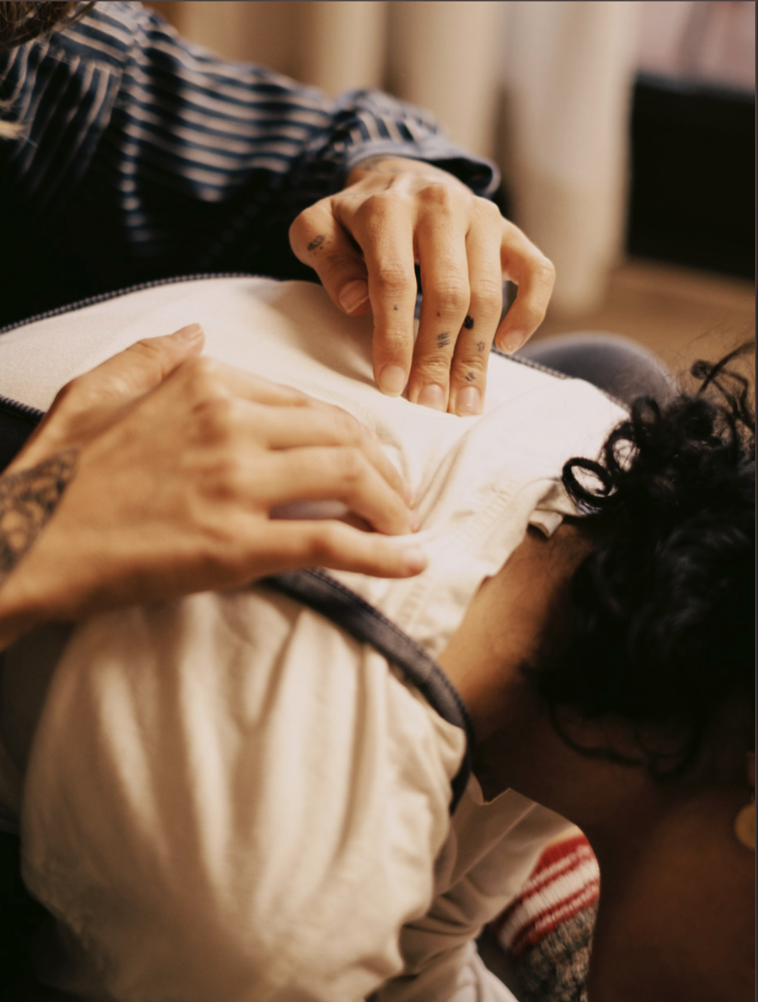A woman is getting a massage on her back.