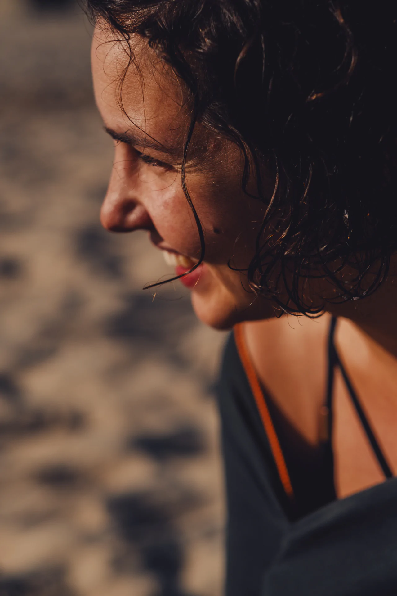 Woman in profile natural light beach portrait Portugal Airbnb Experiences