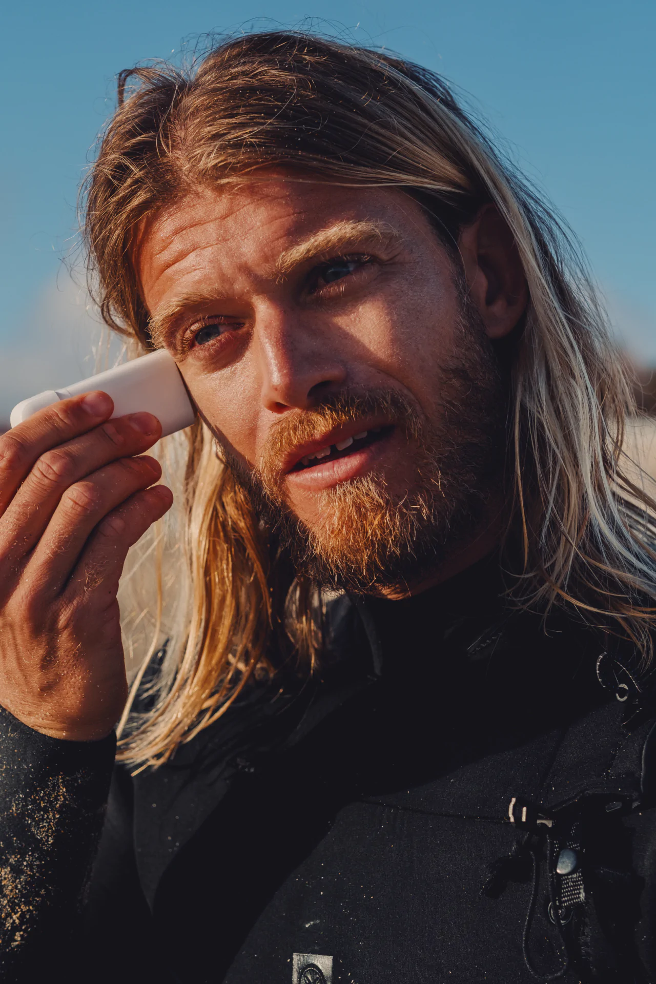 Surfer candid portrait golden hour Portuguese coast